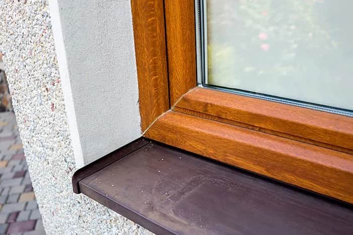 Czym uszczelnić szparę między oknem a parapetem? Skuteczne metody i porady